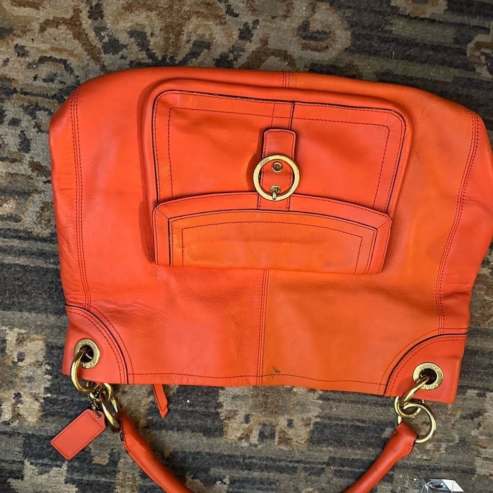 Coach purse: Hampton Turlock North South Leather Satchel (vintage)
Coral color